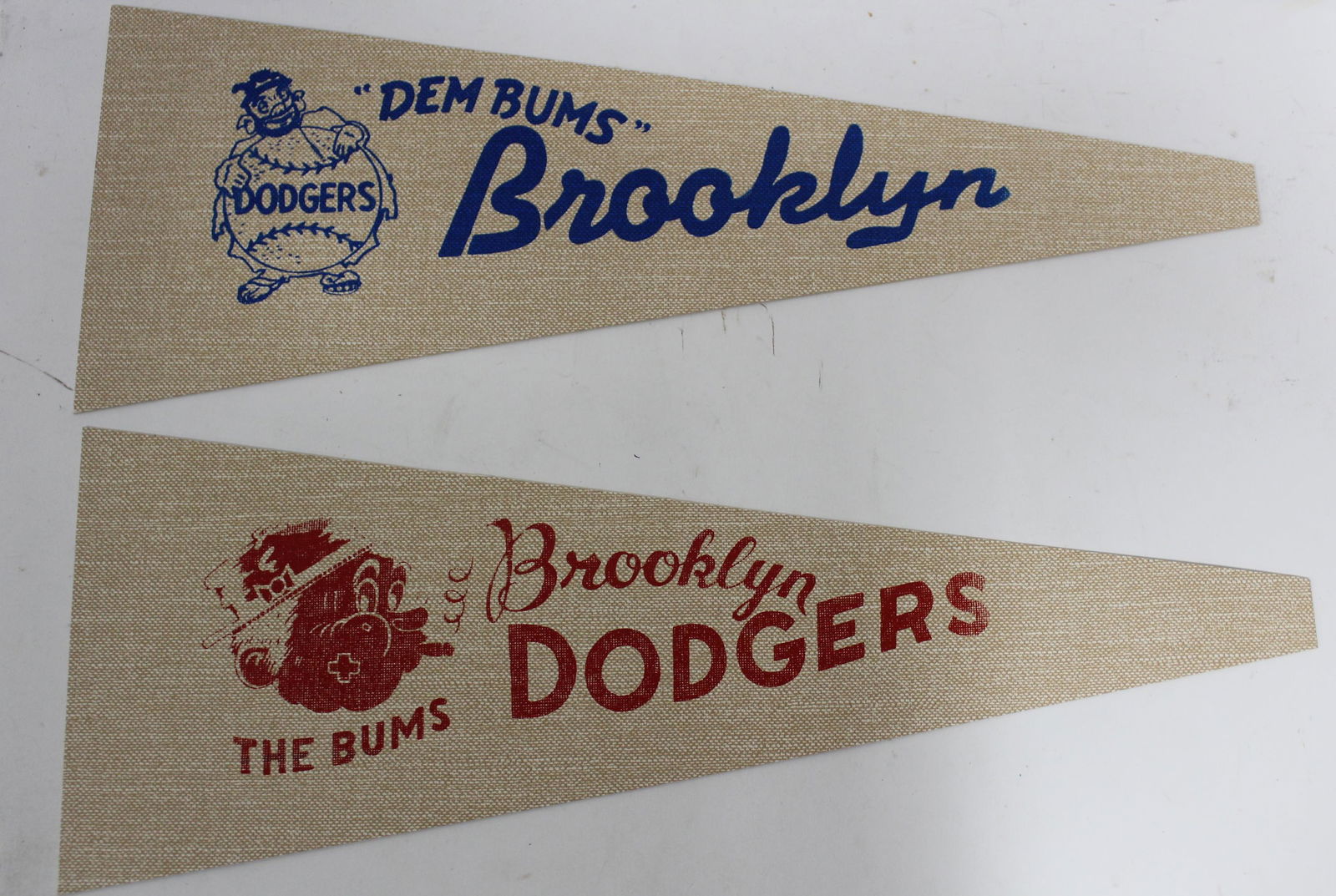 Cardboard Pennants (2) Dodgers: Brooklyn Dodgers, The Bums an Brooklyn Dodgers, "Dem Bums" Two in the lot. 19"L