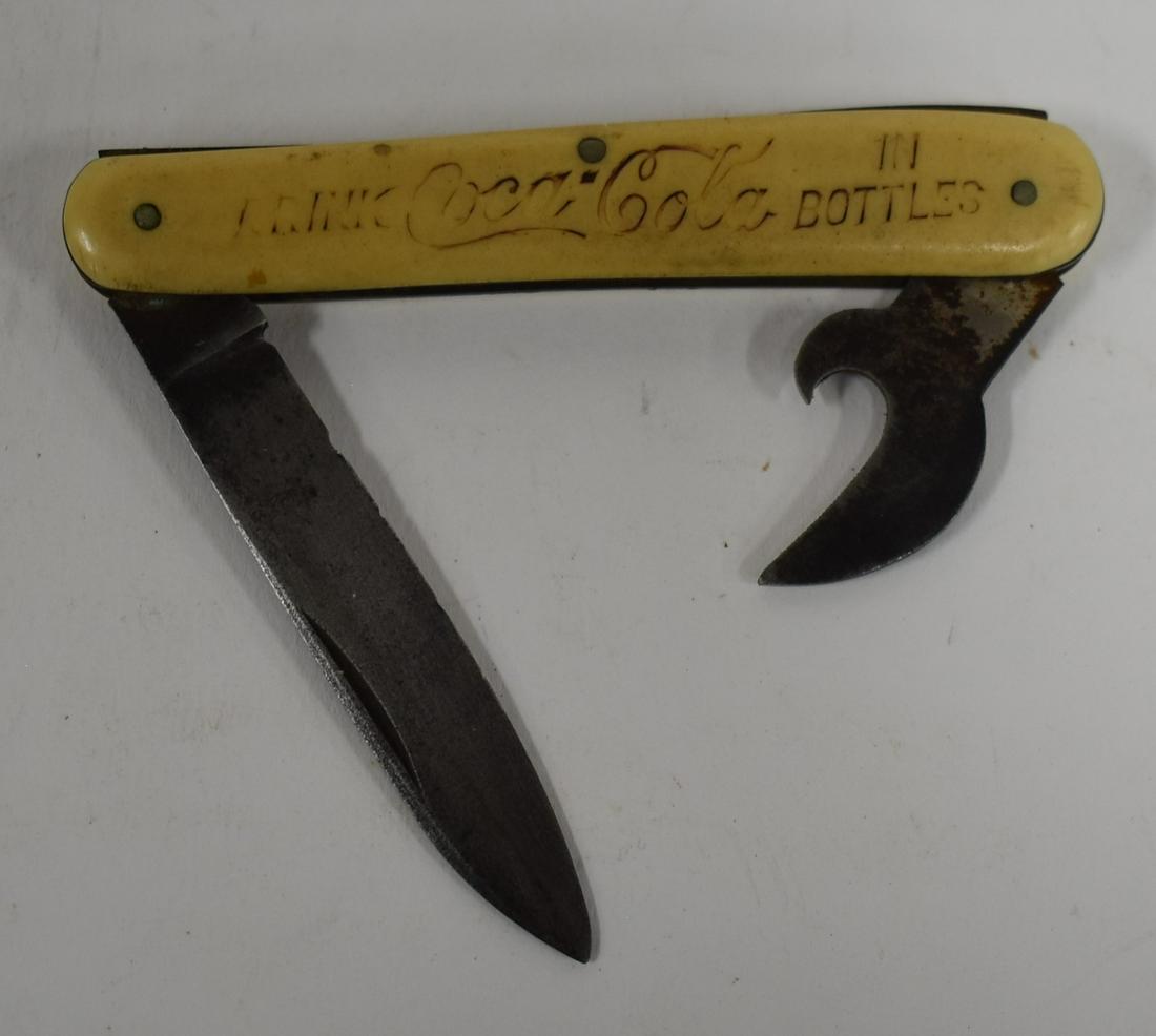 1915 Bone Coca-Cola Pocket Knife: "Drink Coca-Cola in Bottles" on one side is faded. Delicious and Refreshing on other side -good. 3"L