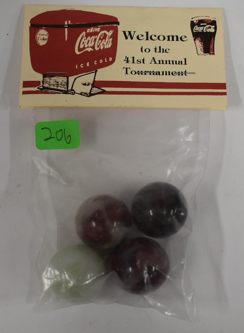 Vintage Coca Cola 41st Annual Tournament Marbles: In original packaging. 4 marbles in the bag.