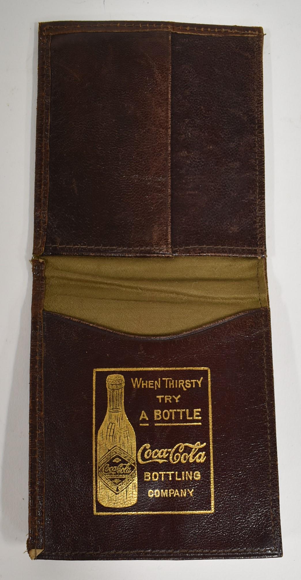 Alligator Coca- Cola Billfold: In gilt lettering at the inside. When Thirsty Try a Bottle. Coca-Cola Bottling Company. Bottle depicted