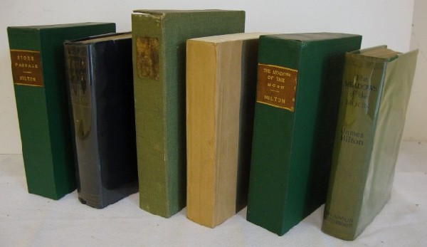 HILTON, JAMES THREE FIRST EDITIONS: 1926 The Meadows Of The Moon. London, in a green sleeve with leather name plate, tooled gold lettering. 1922 Storm Passage. London, in green sleeve with leather name plate, tooled gold lettering. 1941