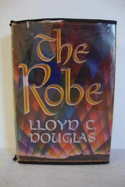 LLOYD C. DOUGLAS. THE ROBE SIGNED & TLS: 1942 Boston, with d/j, inscription on gummed label laid in "for my great friend Gene Andrewski wih warm regards Lloyd C. Douglas. Lot includes a TLS on Douglas imprinted stationery dated Dec 21, 1943 