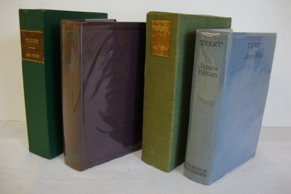 HILTON, JAMES TERRY (2) FIRST EDITIONS: Thornton Butterworth, London 1927 hardcover First Editions, First Published 1927. Maroon cover. Glassine protective wrappers, green cloth board sleeve. Sold with a second copy , Thornton Butterworth L