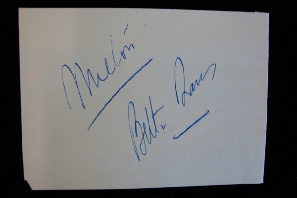 BETTE DAVIS AUTOGRAPH: On a pale yellow album page. In blue ink. "Milton, Bette Davis" 5 x 3-1/2