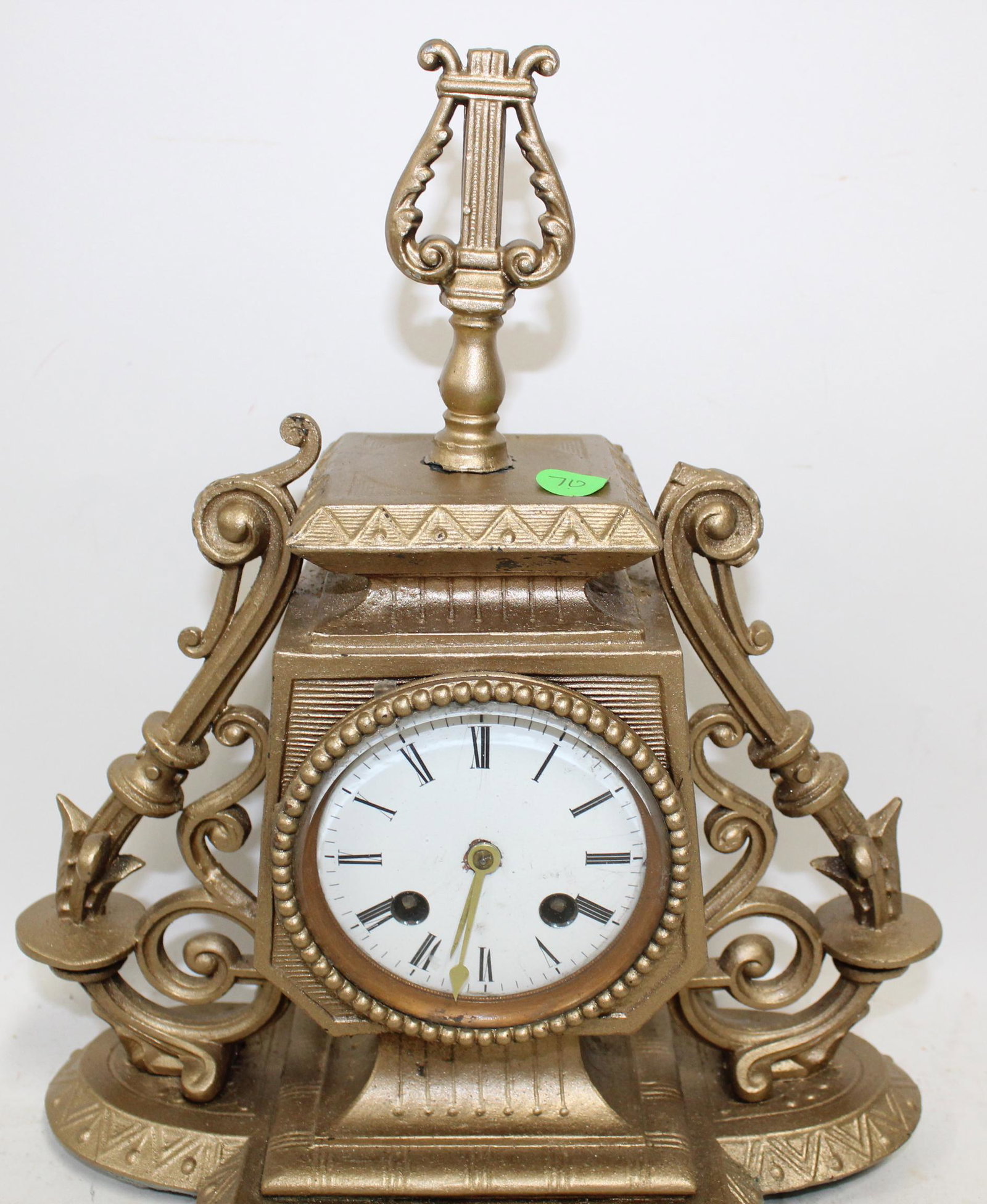 Metal Mantel Clock.: Gold Metal Mantel Clock.
