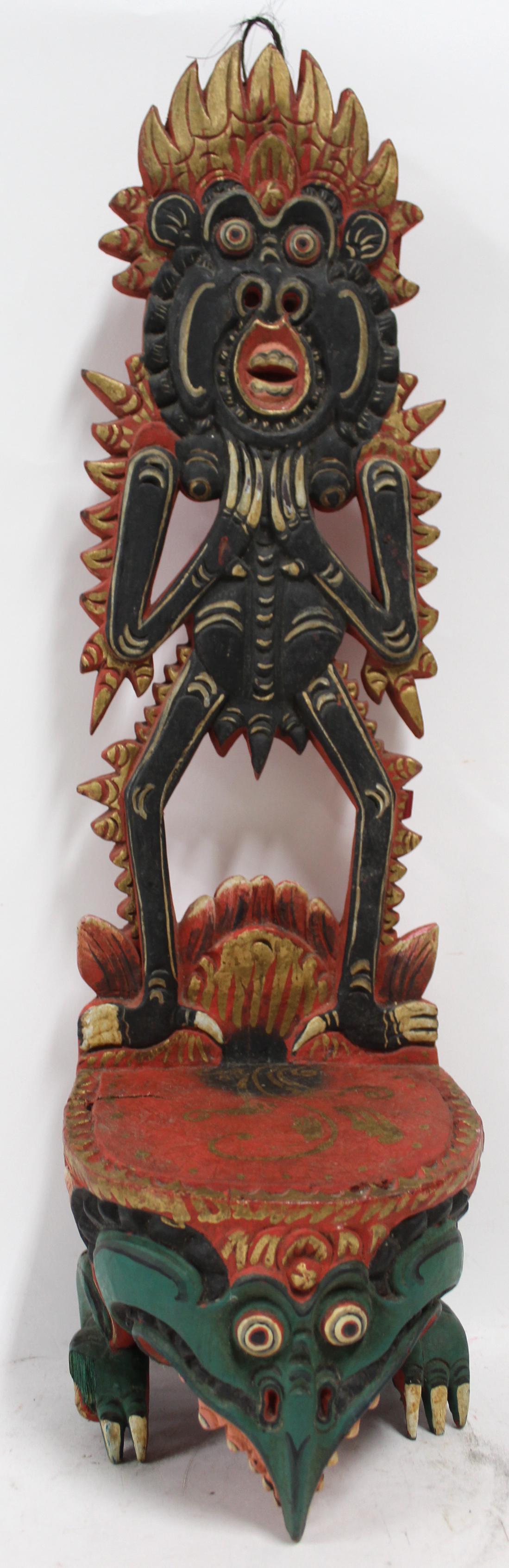 Polynesian Wood Carved Statue: Polychromatic. 1 small crack will be seen in pictures.