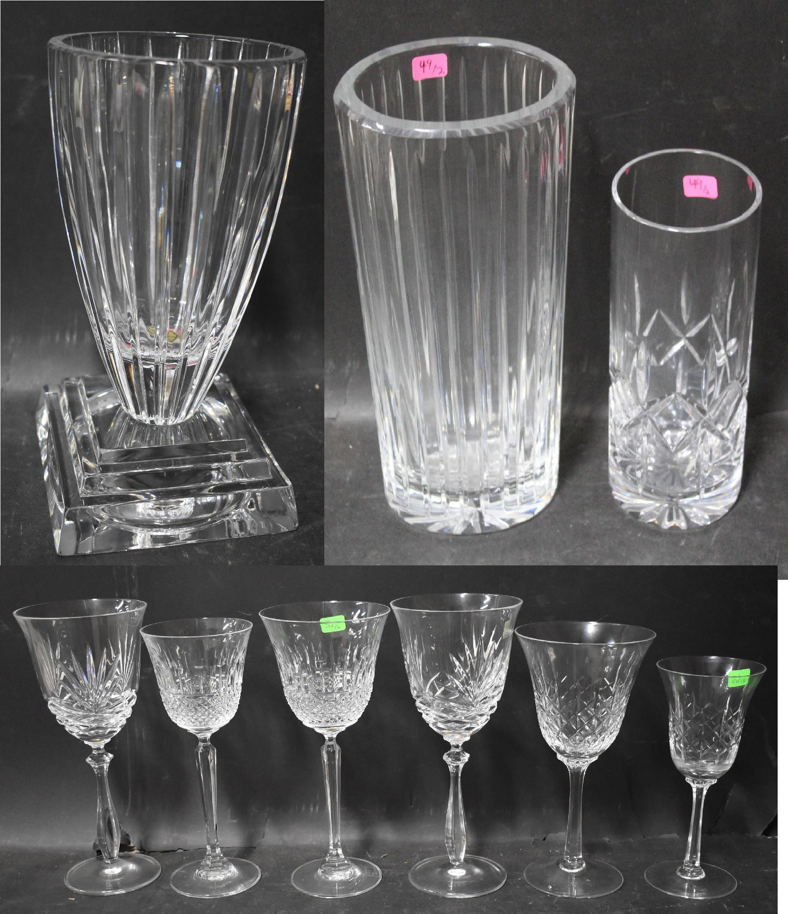 Dealers Lot of Crystal (9): 9 Pieces of crystal and glass in lot. Polished Crystal Pedestal Vase-Made in Poland. 8.75 in H x 5 in W. Pressed Glass Vase (2)-8 in H & 10.25 in H. Lot Of Wine Glasses (6)- 2 are crystal. 6.5 in - 8.