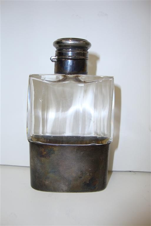 BLACK STARR &FROST STERLING MTD. FLASK: Unique beveled glass and sterling silver pocket flask. 1 1/2 oz Signed Black, Starr and Frost. and numbered S602. 3 3/4 H.