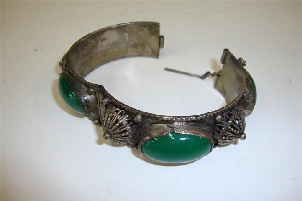 MIDDLE EASTERN SILVER BRACELET: Large oval green stones Safety post.