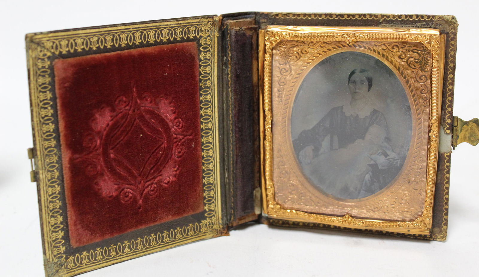Victorian daguerreotype. Rare book form case (1 of 3)