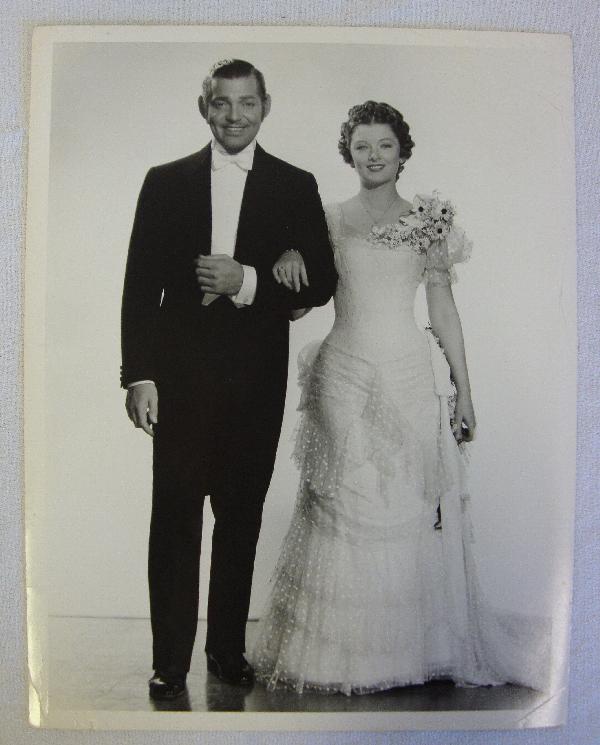 MYRNA LOY, CLARK GABLE, CLARENCE S. BULL: Back stamp for MGM and Clarence Sinclair Bull. Stamp for Dell Publishing Company. Date stamp for January 1937. Publicity snipe for Parnell. 10" x 13"