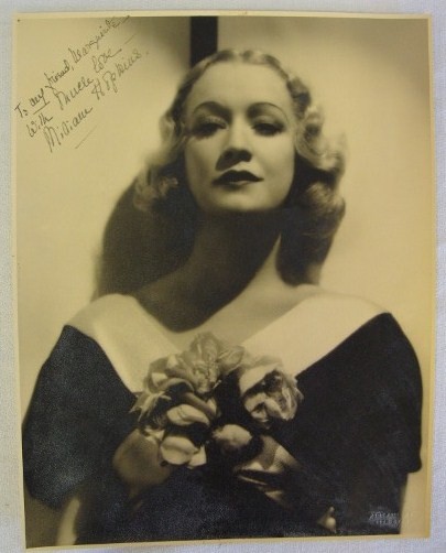 MIRIAM HOPKINS - ISP OTTO DYAR PHOTO: Portrait by Otto Dyar, with Blind stamp recto. Crème matte finish. Inscribed "To my friend Marguerite with much Love, Miriam Hopkins" 10 1/2" x 13 1/2"