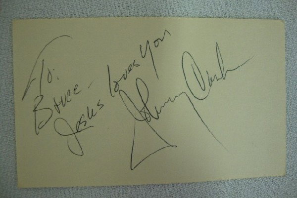 JOHNNY CASH AUTOGRAPH: "To Bruce Jesus Loves You. Johnny Cash" on a white card. 3 x 5. VF
