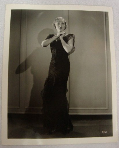 MADGE EVANS PHOTOS - C.S. BULL & HAL PHYFE: Double weight photo 3355-61-57 "Starched Alencon Lace" A fashion photo with back stamp for Bull & attached publicity snipe for Hattie Carnegie design shown. Second photo is a 1931 Hal Phyfe. Signed in