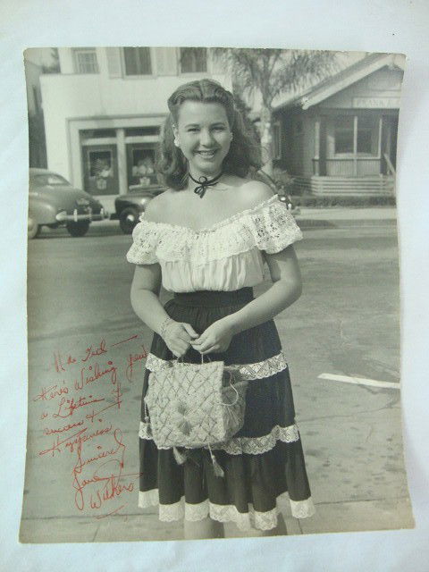 CARSTENS PORTRAIT OF JANE WITHERS SIGNED: Double weight. Back stamp for Theodore R. Carstens. Inscribed in red ink Hi Ted Here's wishing you a lifetime of success & happiness. Sincerely, Jane Withers. Lots 82 Through 88 of this sale are inscr