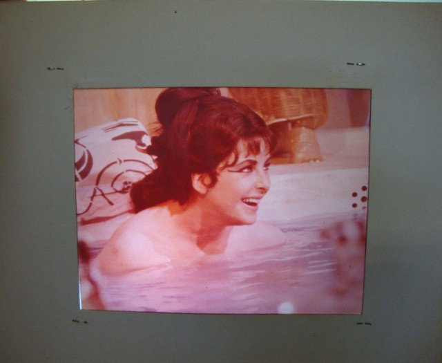 CLEOPATRA (ELIZABETH TAYLOR) COLOR NEGATIVES (29): Twenty nine original color negatives for Cleopatra. Elizabeth Taylor close-ups and scenes (26); Three scenes. All 4 x 5. All stapled into mats. VF