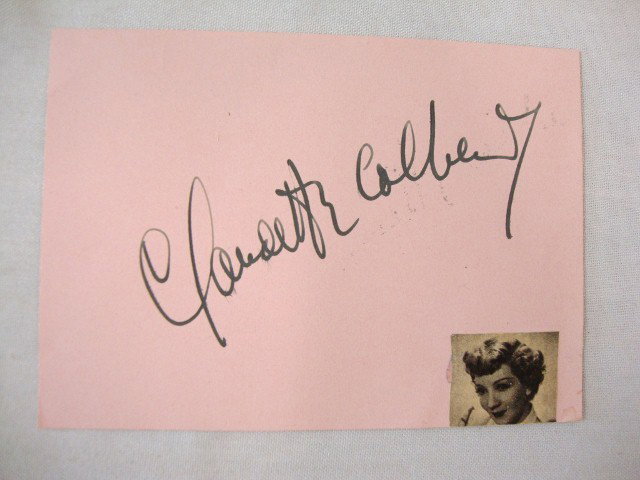 CLAUDETTE COLBERT AUTOGRAPH: Signed boldly in black ink on a pink album page. 3 1/2 x 5. VF-F