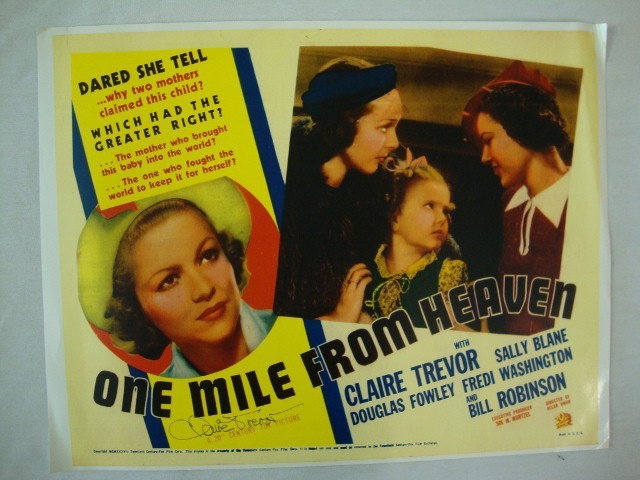 CLAIRE TREVOR AUTOGRAPH: Signed Claire Trevor in blue ink on a photographic image of One Mile From Heaven lobby card. 11 x 14. VF-F (crease in upper right corner)