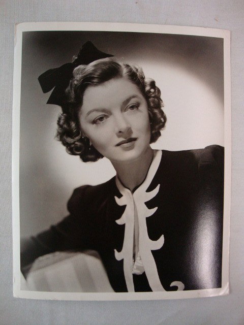 MYRNA LOY DELUXE PORTRAIT BY WILLINGER: Double weight. Back Stamp for MGM. And Willinger. #8341. King Features back stamp. International News Service back stamp. Publicity snipe for " I Love You Again". Back stamp for Douglas Whitney Collec