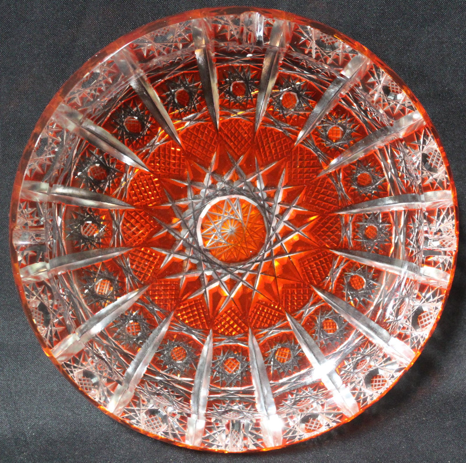American Red Cut-to-Clear Glass Ashtray: 7.5 in D.