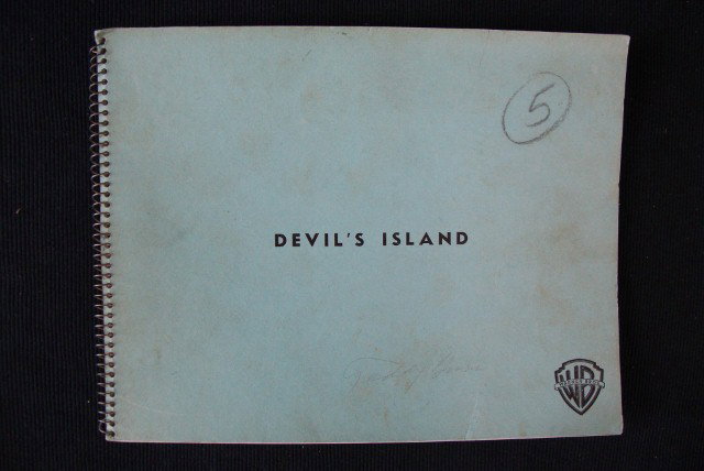 DEVIL'S ISLAND WARNER BROS. KEYBOOK: Devil's Island. Warner Bros. Boris Karloff. 21 photographs of the film with a spiral binding Blue Covers with Warner Bros. logo and film title. All 8 x 10. Photos #'d