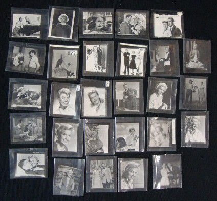 DORIS DAY CONTACT NEGATIVES (27): Many scenes from movies, each negative has a print which accompanies it. Close-up portraits; with Ronald Regan in The Winning Team; with Kirk Douglas in Young Man With a Horn; with Ginger Rogers, with