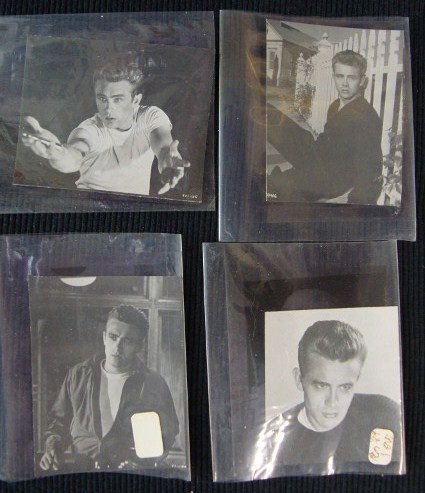 JAMES DEAN CONTACT NEGATIVES (4): Each negative has a print which accompanies it. Four dramatic c/u and 3/4 length portraits of the iconic young actor. Each in a protective glassine holder. 2 1/2 x 3". VF