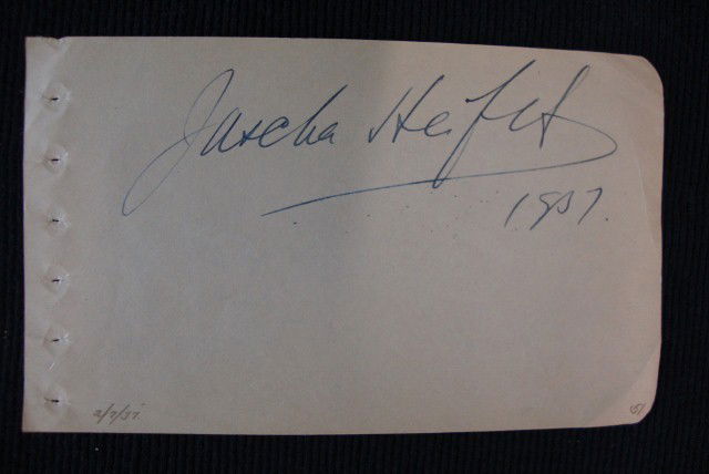 JASCHA HEIFETZ AUTOGRAPH: Jascha Heifetz signed in blue ink on a 3 1/2 x 6" album page and dated 1937.