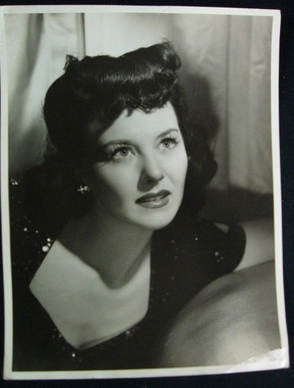 PAMELA BLAKE PORTRAIT BY CLARENCE S. BULL: Double weight deluxe portrait with a back stamp for Clarence S. Bull & M-G-M. Date stamp for 1943. Publicity snipe for Slightly Dangerous in which Blake played Lana Turner's girlfriend. Swing Shift Ma
