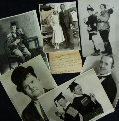 LOT OF LAUREL AND HARDY PHOTOGRAPHS (6): Linen backed 1938 publicity portrait of the two with apples & school books; portrait of Oliver Hardy; portrait of Stan Laurel (both with a 1936 date stamp); double weight Laurel on the phone - MGMP - 