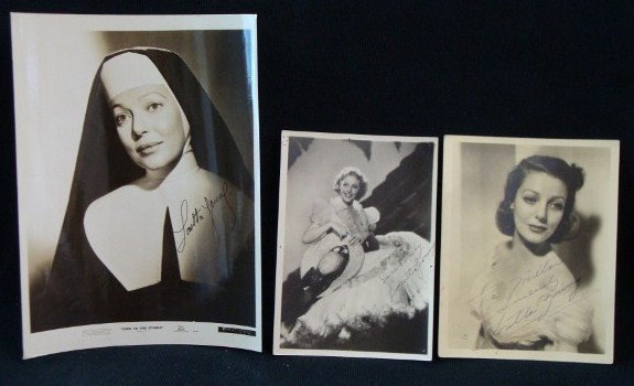 THREE SIGNED LORETTA YOUNG PHOTOGRAPHS: Double weight. Signed. Sincerely Loretta Young. Double Weight 20th C. Fox Publicity photo with logo signed To Milton Sincerely Loretta Young. In Come to The Stable signed Loretta Young. 5 x 7, 5 1/2 x