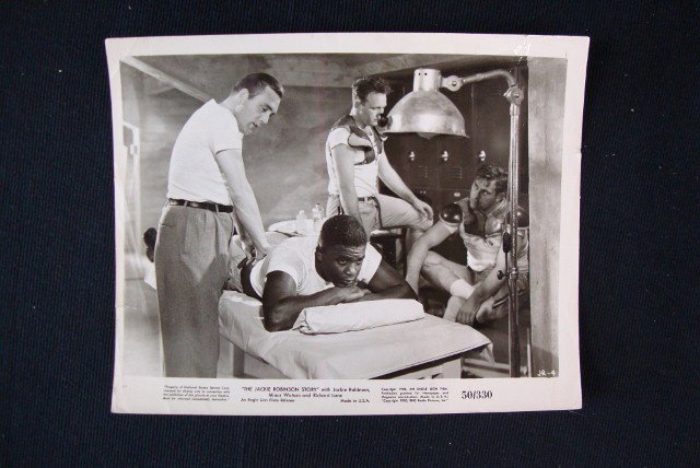 MOVIE STILL - THE JACKIE ROBINSON STORY: 1950 with Jackie Robinson, Minor Watson and Richard Lane. 8 x 10 black & white glossy. VF