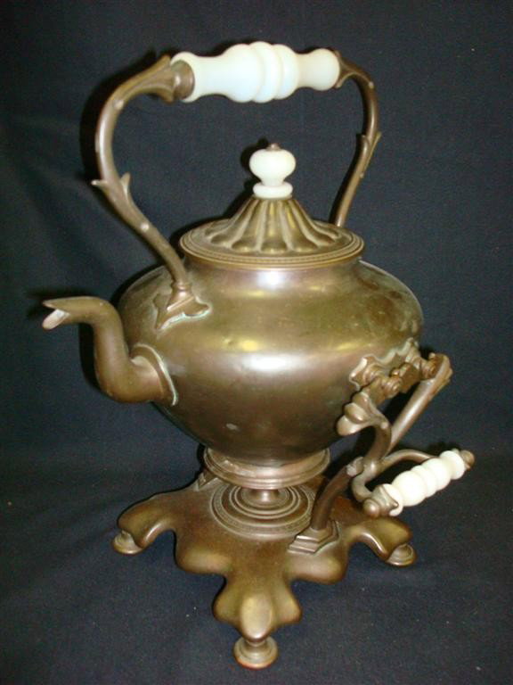 ANTIQUE TILT KETTLE ON STAND: tilt plated kettle on stand with milk glass knob and handles; 16in. H. x 12in. W.