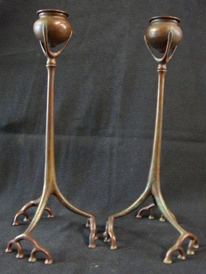 PAIR OF TIFFANY BRONZE CANDLESTICKS: bronze, pair of Tiffany Studios root candlesticks, removeable bobeches, chocolate brown patina. Signed "Tiffany Studios New York" and numberewd 1200; 13in. H.
