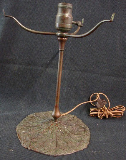 TIFFANY STUDIOS BRONZE LAMP BASE: bronze, Queen Anne Lace design lamp base, to accommodate a 10in. Shade. Signed "Tiffany Studios New York", #325-3