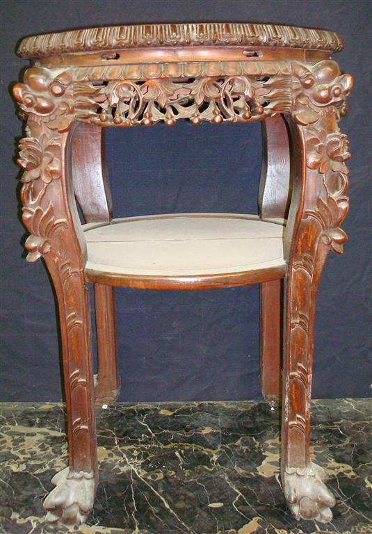 19THC. CHINESE TEAKWOOD STAND: highly carved and elaborate tiered teakwood stand with marble insert;