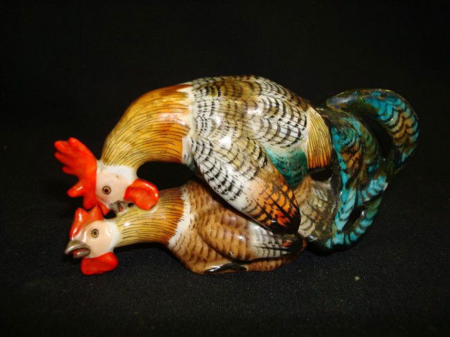 CAPO DI MONTE CAVORTING ROOSTERS PORCELAIN: Well decorated rooster and hen grouping, painted with considerable detail. Blue N and crown mark 2 1/1" H.