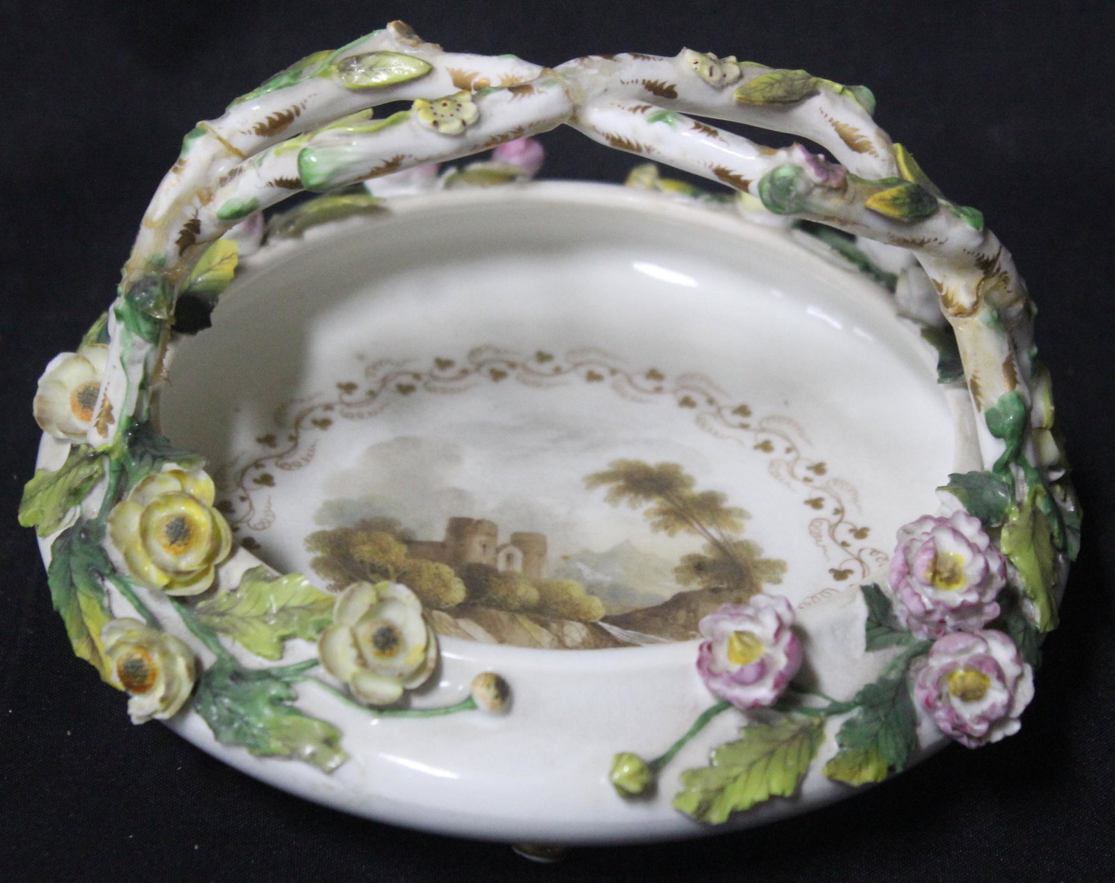 Rockingham Works Antique Bowl: Rockingham Works-Brameld (manufacturer to the King in Scotland) Footed with classical scene at center and ornate applied decorations to the rim Size 8"
