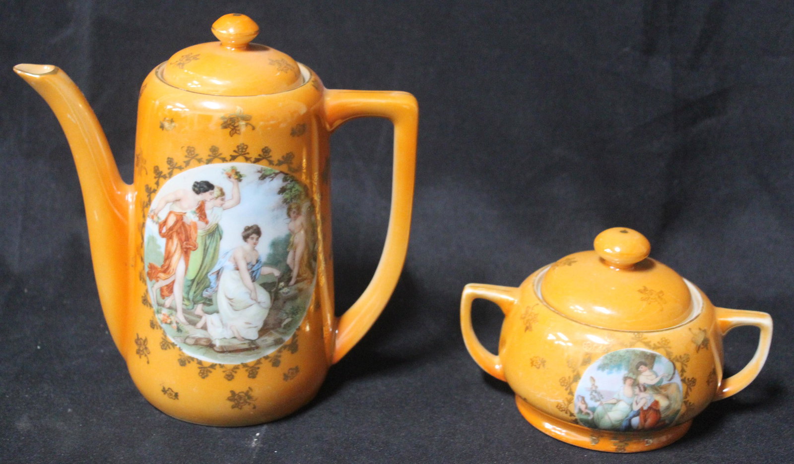 Czechoslovakia Victorian China Pieces (2): Teapot with ladies at the central decoration and marked at the underside Victoria China Czechoslovakia 841 and a sugar bowl, also with ladies decoration at the center, marked the same at the underside