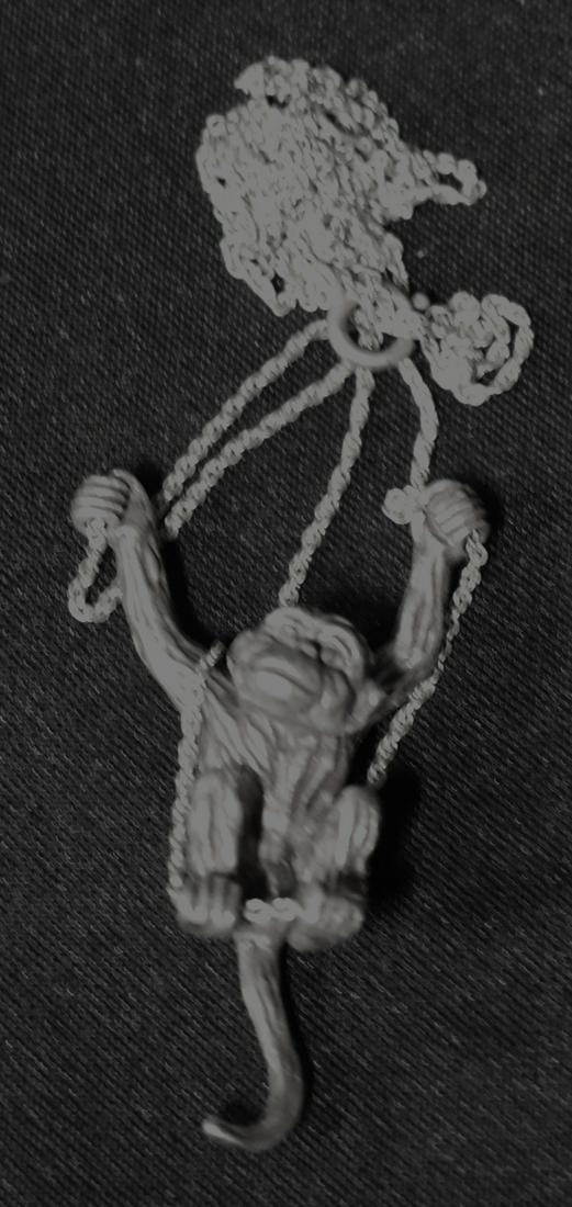 Sterling Silver Monkey Necklace: Sterling Silver Monkey on a sterling silver chain. (28" Long)