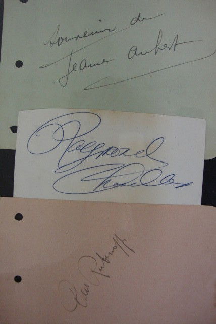 THREE AUTOGRAPHS. AUBERT, CHARLES, RUBINOFF: Jeane Aubert: "Souvenir de Jean Aubert" signed in black ink on page from autograph book blue paper, slight staining. 4-1/2 x 6-1/4; Raymond Charles: Raymond Charles in blue ink on 2-1/2 x 5 cut card,