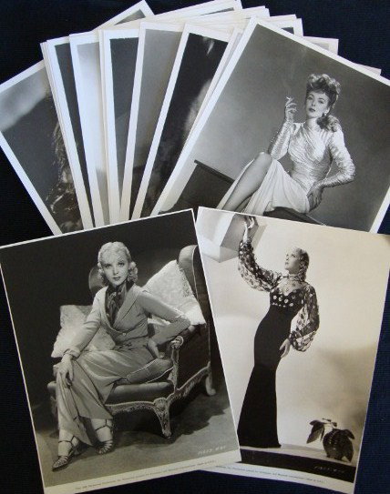 IDA LUPINO MOVIE STILLS (22): Including a double card stock, 2 with publicity snipes both from Anything Goes, along with other publicity photos, portraits and movie stills. 8 x 10