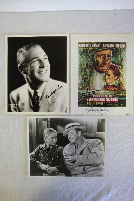 AUTOGRAPHS HUSTON. SCOTT AND COOPER: John Huston signed in black ink on a copy of a French version African Queen poster; Randolph Scott signed in black ink on an 8 x 10 portrait; and Jackie Cooper signed in black ink on an 8 x 10 movie s