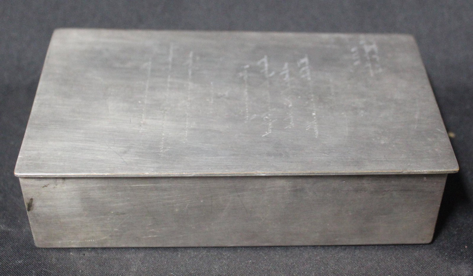 TIffany & Co Silvered Bronze Box: Wedding invitation engraved in the reverse at the top. Cedar lined. Marked Tiffany & Co Makers Bronze and numbered. 3.5" D x 6" W x 1.5" H.