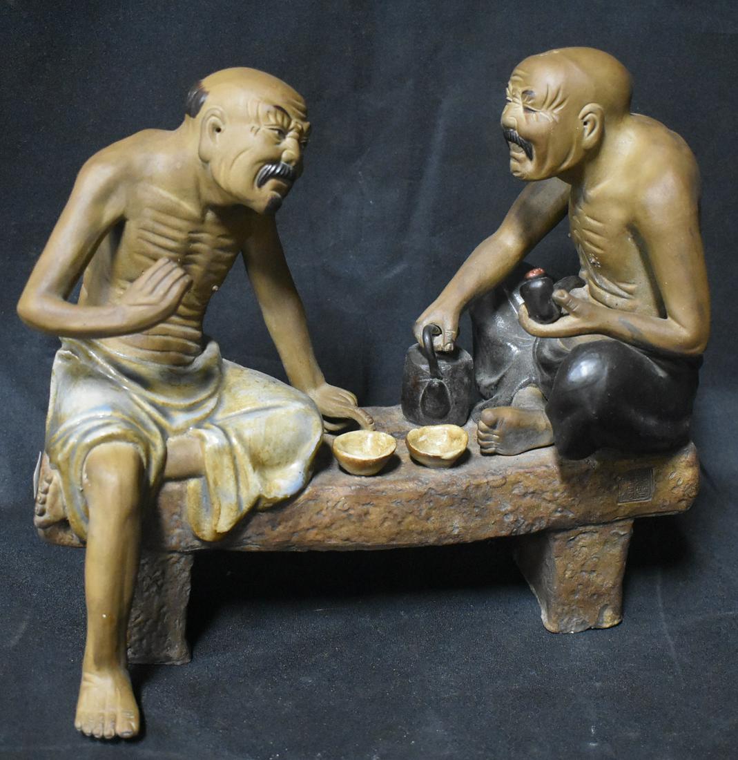 Oriental Mudman Figures on Bench (1 of 5)
