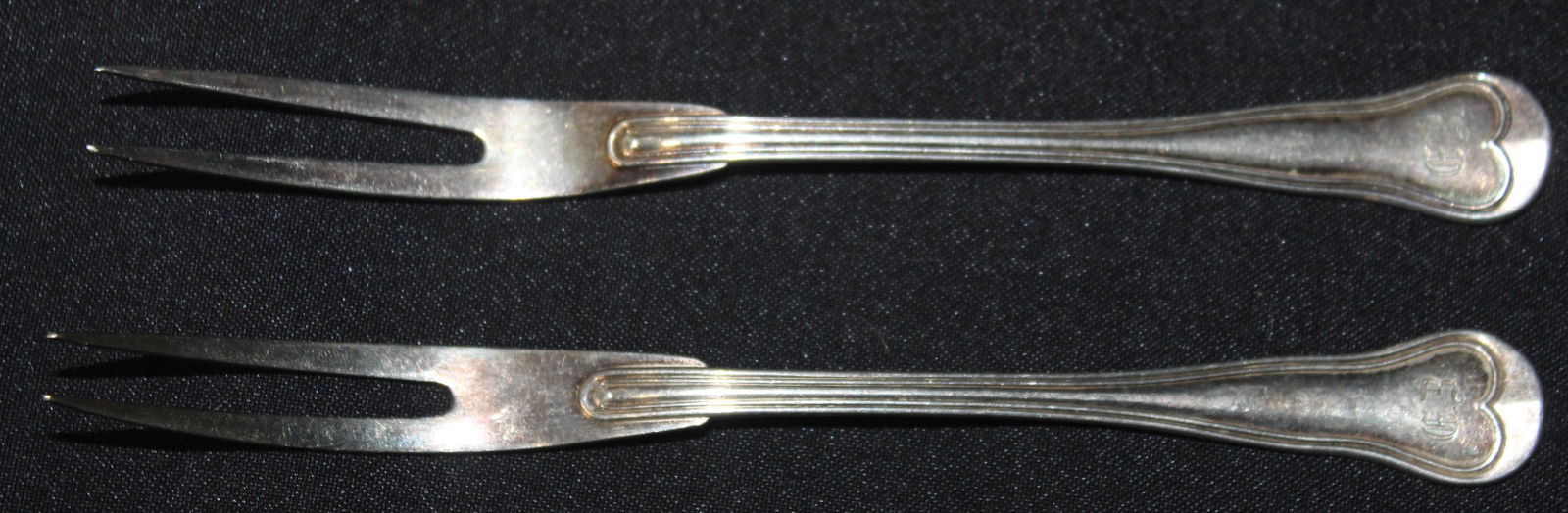 Christofle Sterling Silver Hors D'Ouevres Forks (2): Marked Christofle and with the CC hallmark. 6"L Two in the lot.