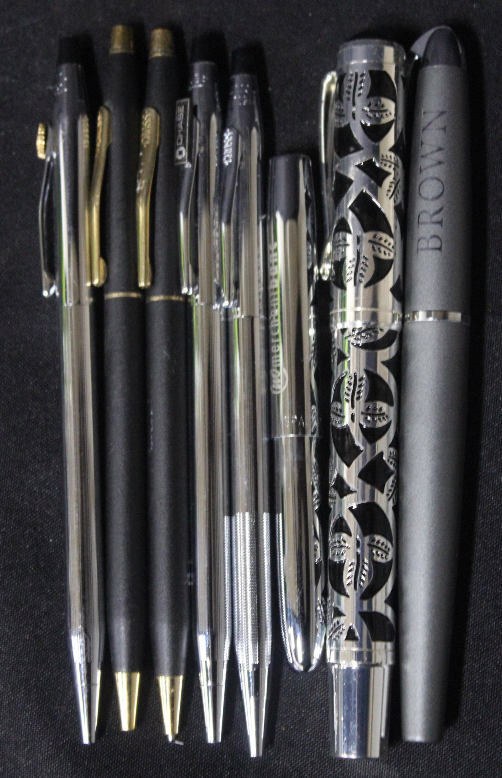 Collector's Lot of Ball Point Pens (8): Fancy "silver" overlay; Mark Cross (3); Advertising (3) Rotary etc. Eight in the lot