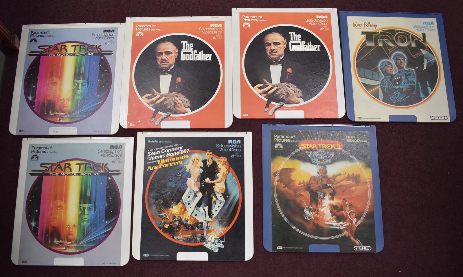 Collector's Lot of RCA Video Discs (7): Includes Star Trek, Tron, James Bond, & The Godfather. Not tested.