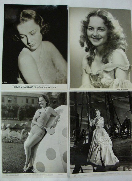 OLIVIA DE HAVILLAND PORTRAITS & STILLS (103): close-up portrait for Warner Bros.; with Joe E. Brown in Alibi Ike (1); in A Midsummer Night;s Dream - 1935, inc. a portrait by Dick Whittington (5); bathing beauty candid (1); in Captain Blood (2); i