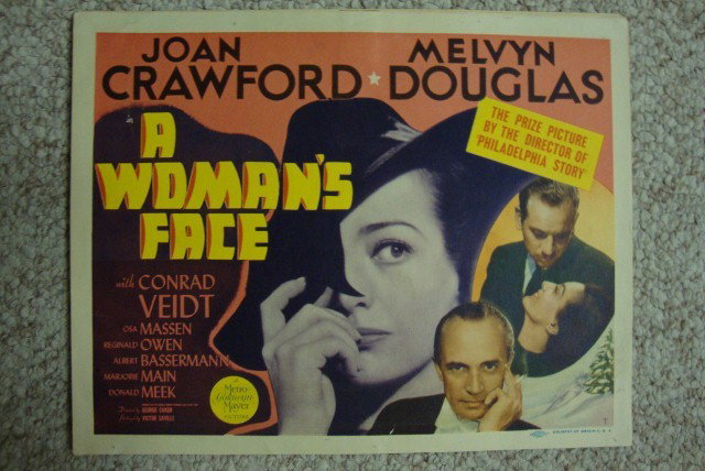 A WOMAN'S FACE LOBBY CARD SET: MGM. 1941. Joan Crawford. Douglas Veidt Eight cards in the lot. 11" X 14" VF-F